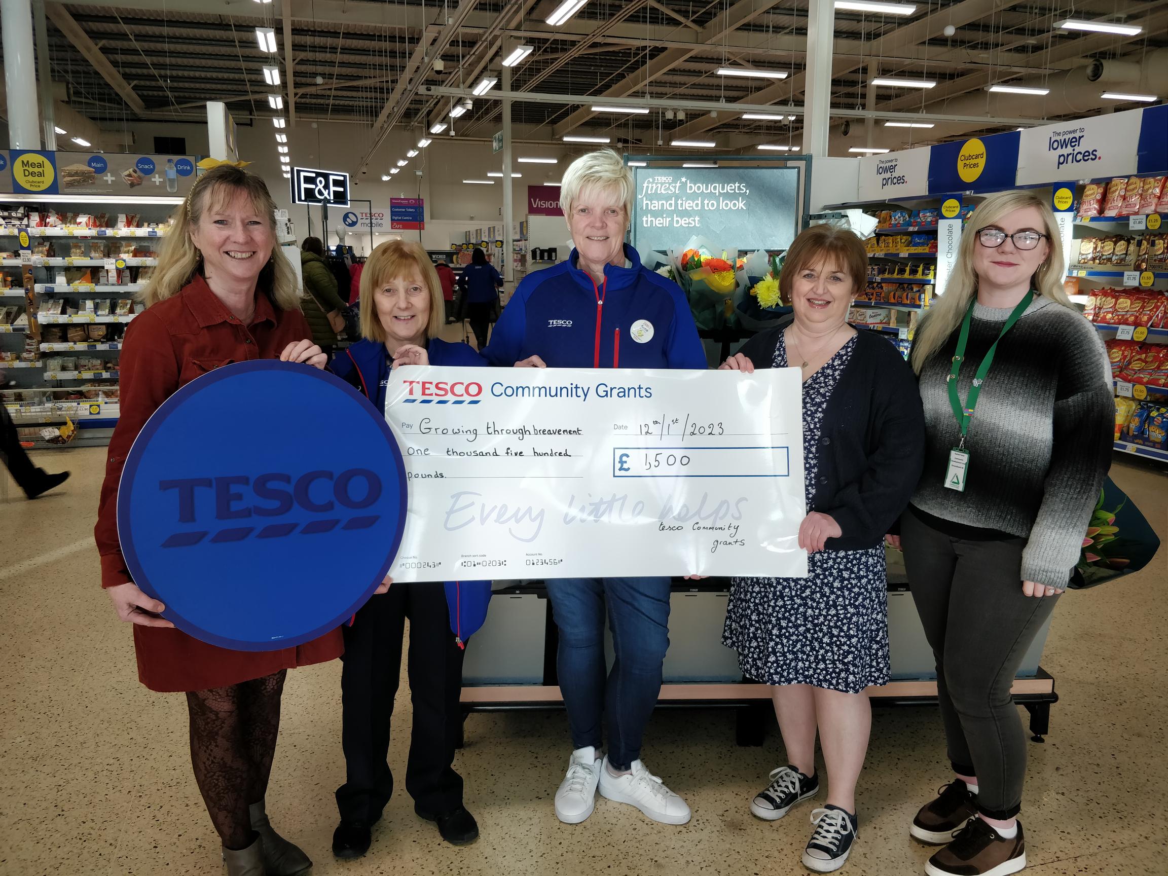 Recieving the cheque from Tesco's groundworks grant